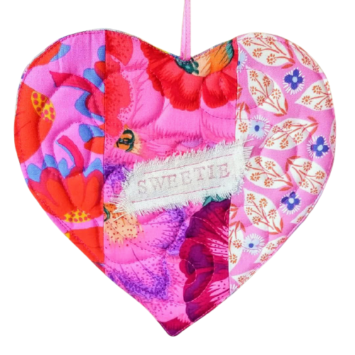 Sofia Whitehead, "Sweetie", wall hanging, fabric, 8.5 x 8.5", $27. 	Color makes me happy. My art aims to bring whimsy and wonder in everyone's life.