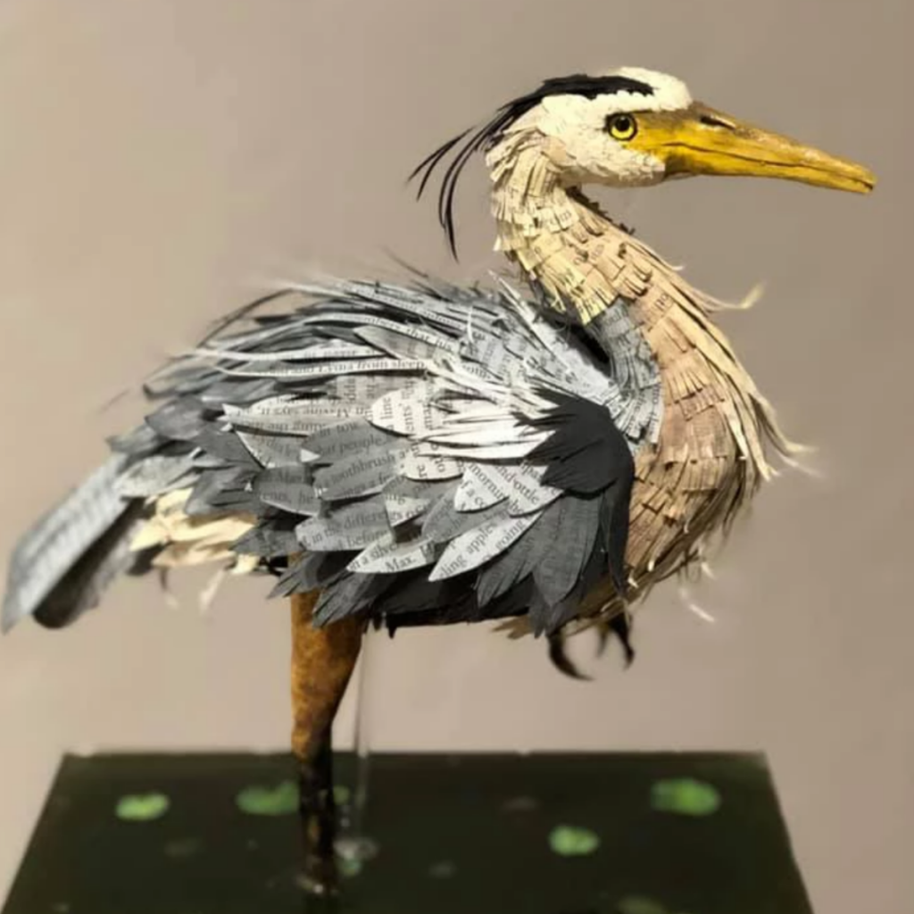 Christian Davila, "Great Blue Heron", 3D printed body covered in intricately cut book paper, 12" tall, 6" x 5" wide, $500.