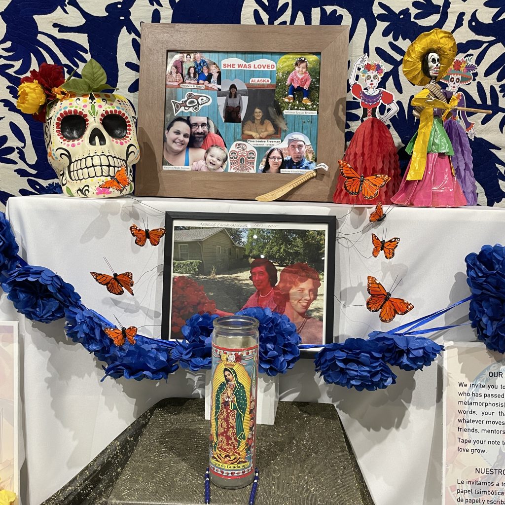 Photos of loved ones on the ofrenda